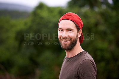 Buy stock photo Smile, portrait and man hiking outdoor for travel, adventure and holiday trip in countryside. Face, trekking and person with cap in forest for tourism, vacation journey and exploration in Switzerland