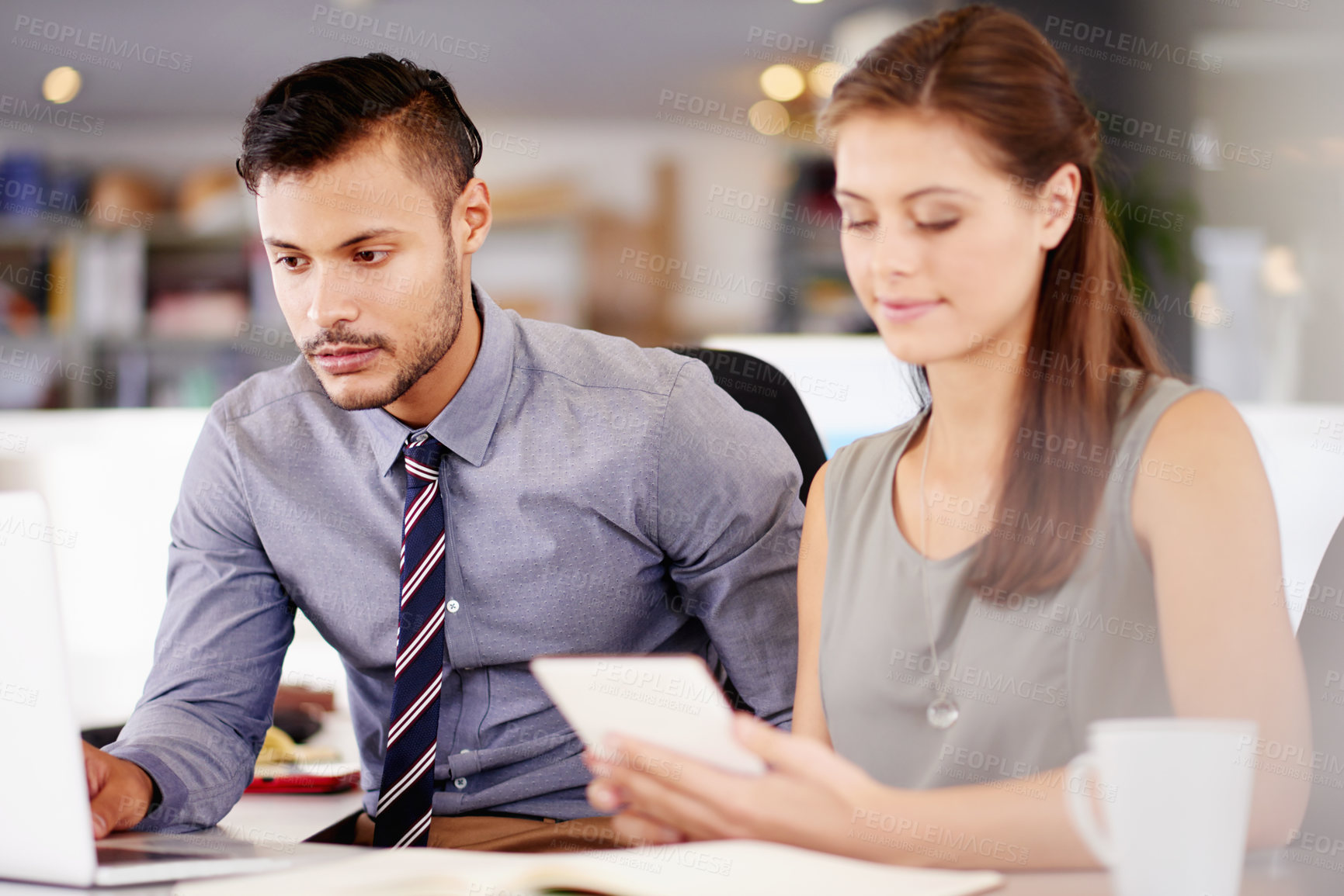 Buy stock photo Collaboration, laptop and tablet with business people in bank together for account management. Finance, portfolio or savings with man and woman employee team in workplace for investment planning