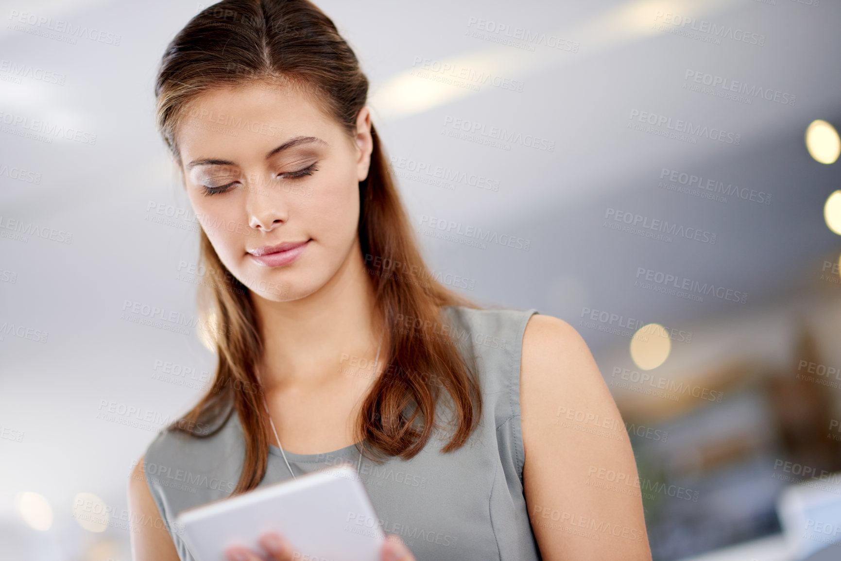 Buy stock photo Tablet, online and business woman in office for content writing, blog and deadline at night. Digital technology, startup and worker with research article, creative and upload on social media platform