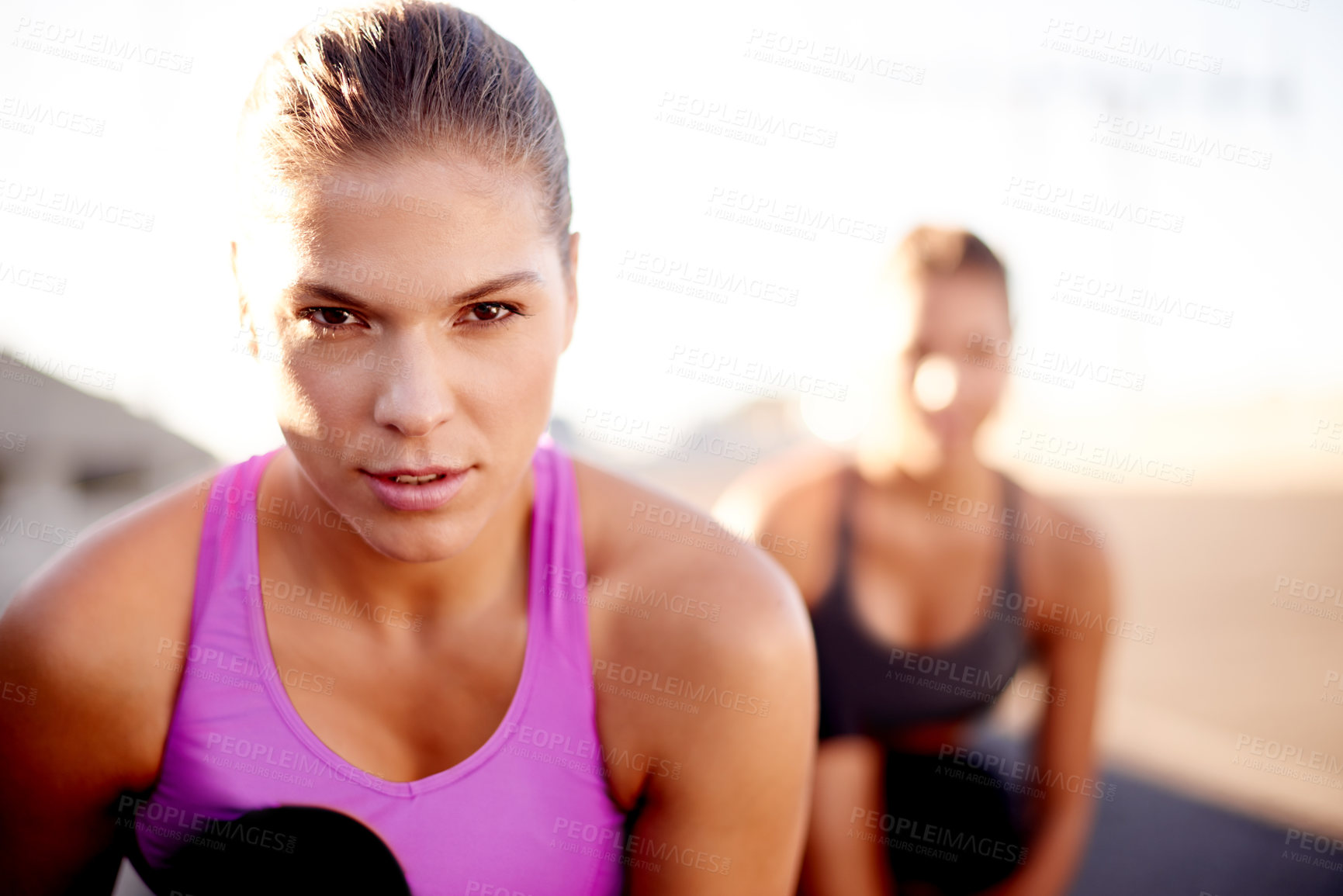 Buy stock photo Women, start and portrait in city for fitness, ready and competitive on bridge. Friends, confident and runners in urban Portugal for cardio, training support and outdoor for sports race or wellness