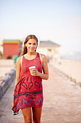Buy stock photo Camera, woman and travel with coffee for walking, vacation destination and espresso for caffeine. Promenade, female person and photographer with tea for drink, adventure and sightseeing at seaside