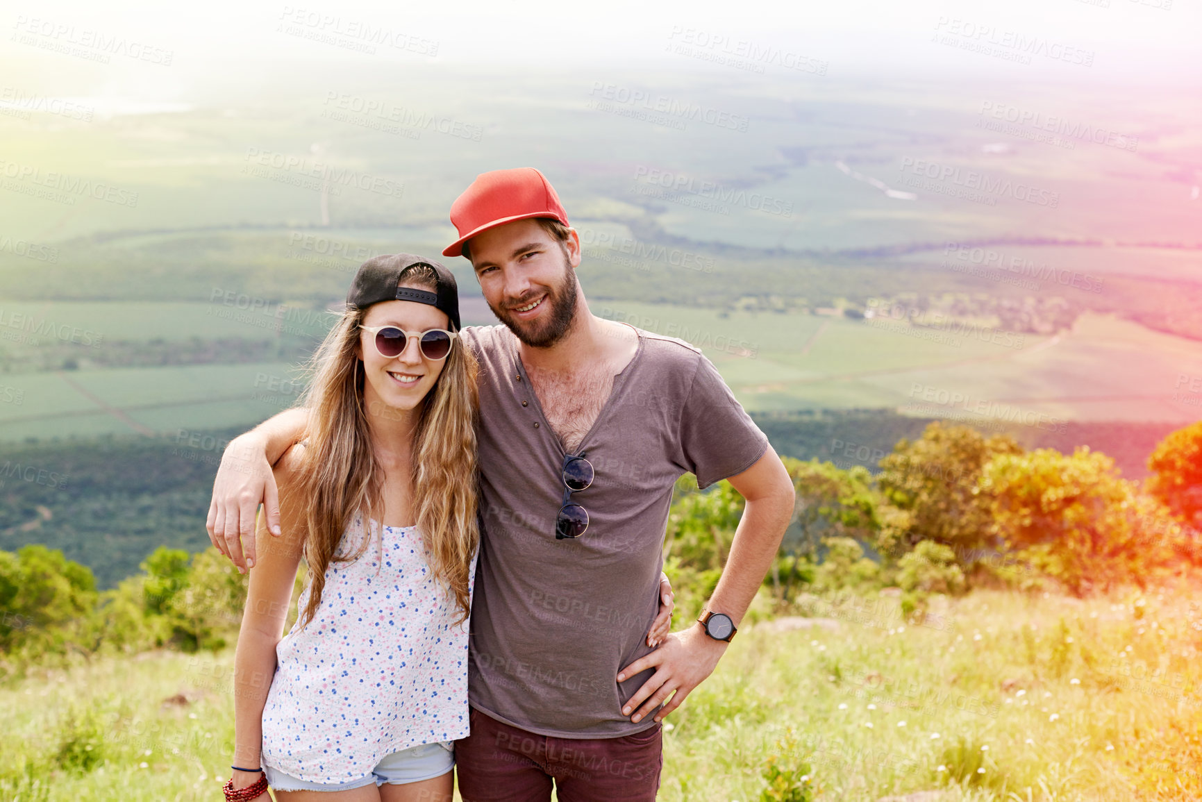 Buy stock photo Travel, couple and mountain portrait in nature for trekking adventure, summer hiking and holiday weekend. People, happy and bonding together in countryside for sightseeing, exploration and support