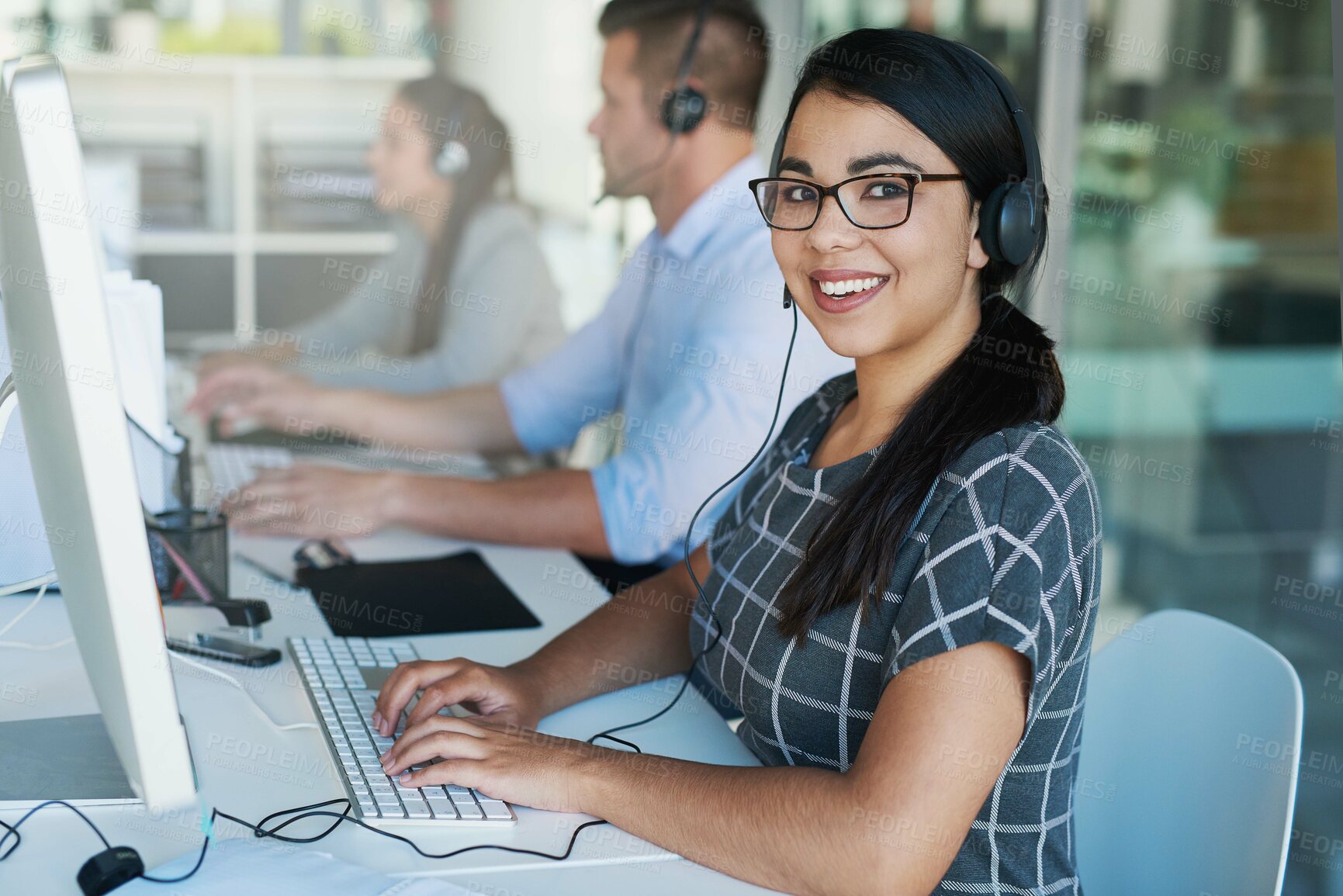 Buy stock photo Portrait of a happy and confident young woman working in a call center