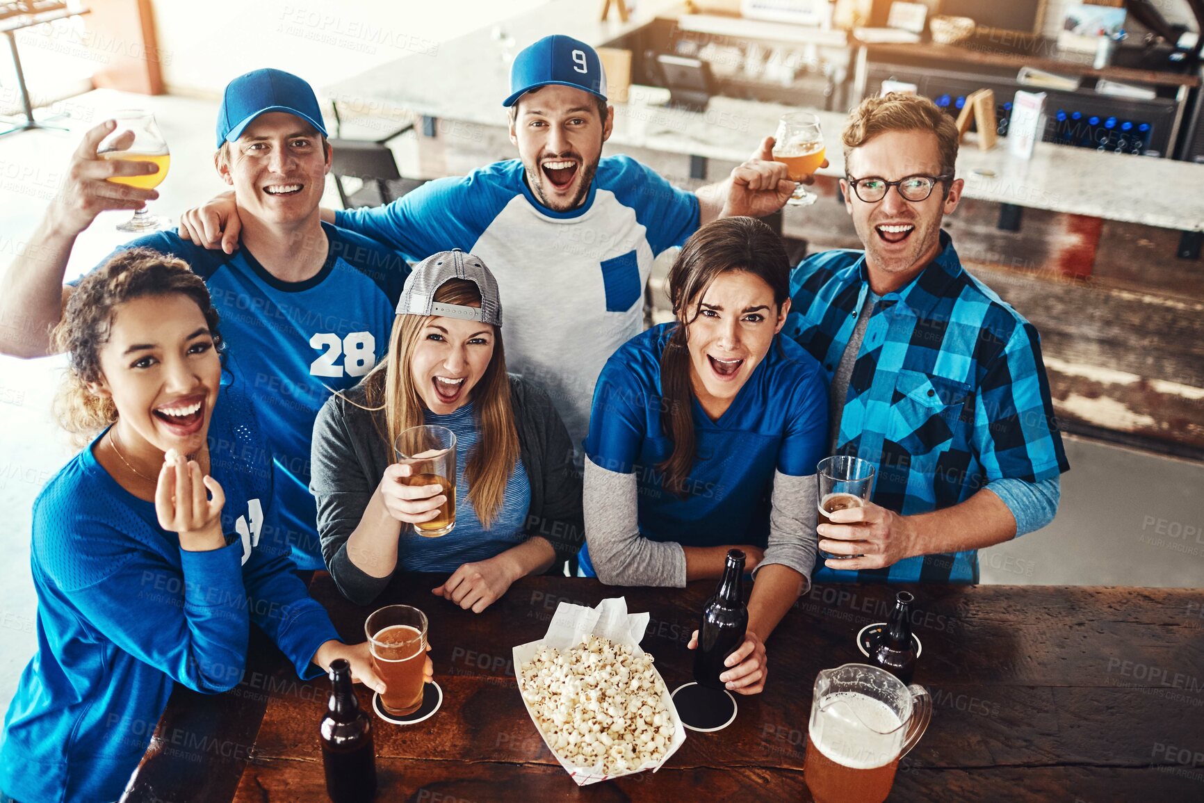 Buy stock photo Beer, sports and portrait of fans in pub for winning game with goal for celebration in support together. Excited, popcorn and friends drink alcohol and watch broadcast television of team match in bar