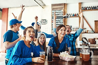 Buy stock photo Friends, celebration and watching tv at sport pub with game, goal and beer at restaurant with support. Fan group, smile and happy with esports, live broadcast and match together at bar with win