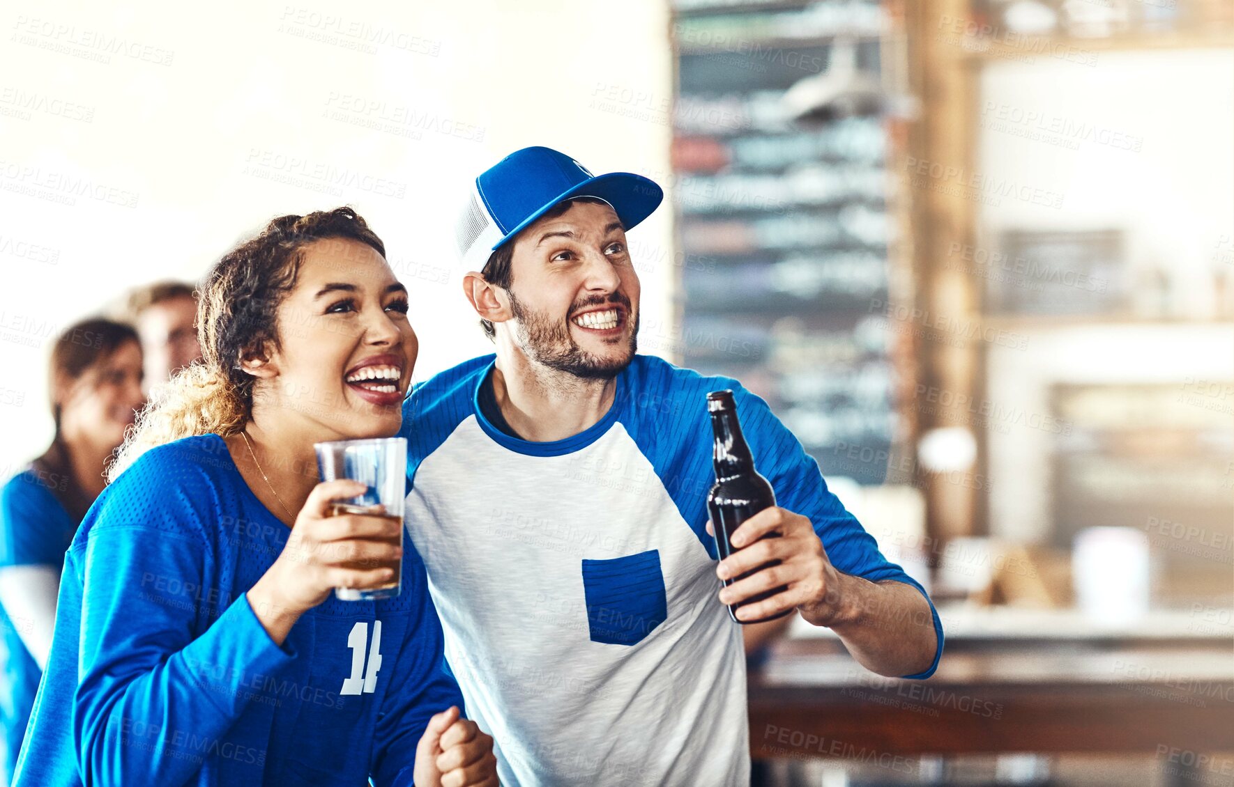 Buy stock photo Sports, excited or couple in pub with alcohol, smile or celebration of competition together. Suspense, soccer game or fun people in bar for watch party, beer drinks or fans at diner for happy hour