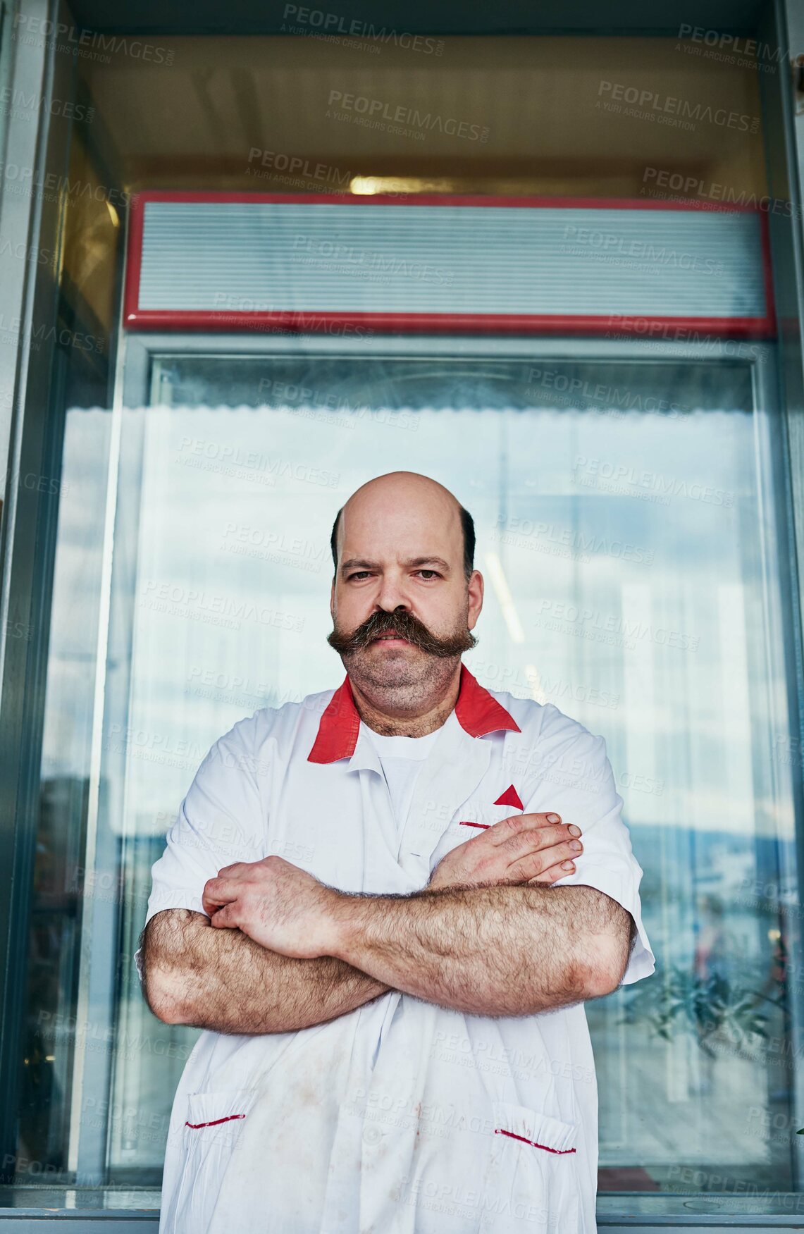 Buy stock photo Portrait, man and butcher at market with arms crossed at small business startup. Worker, confidence and meat seller at retail store with face for pride of professional owner outdoor at shop in USA