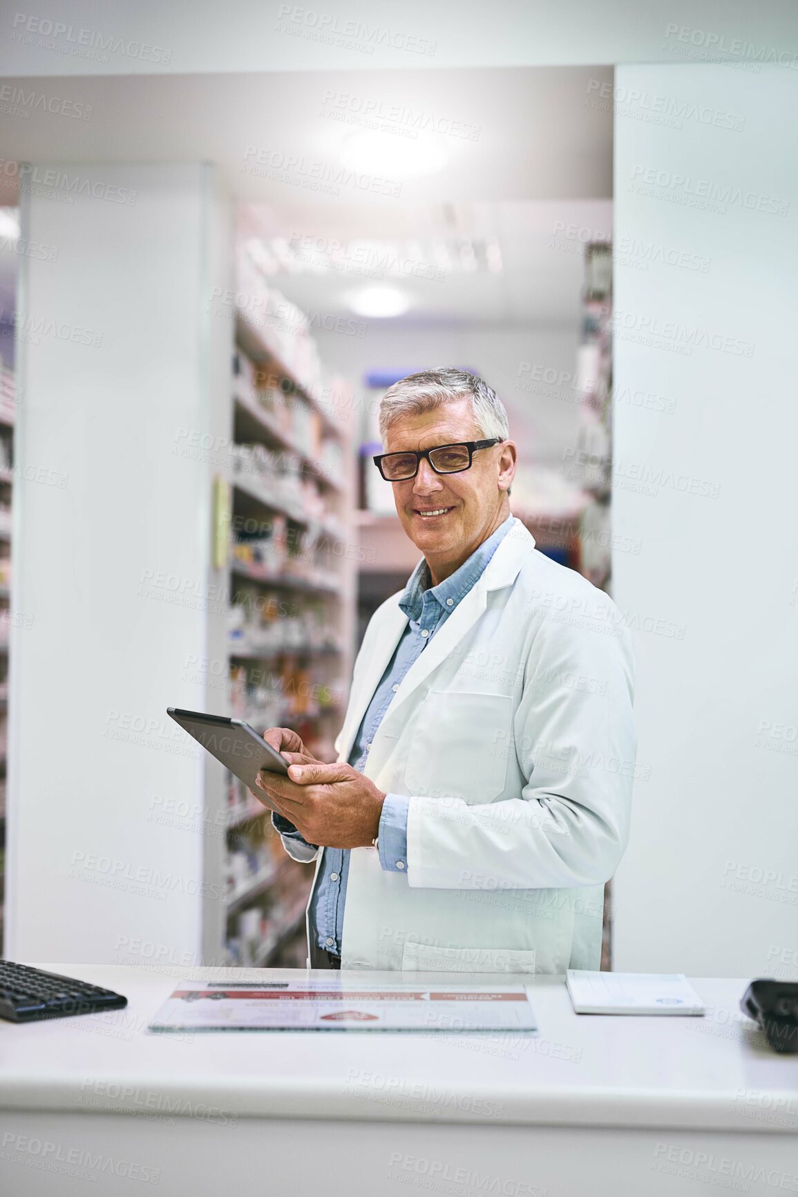 Buy stock photo Pharmacy, medicine and man on digital tablet for stock inventory, system and database update in portrait. Mature doctor or retail pharmacist with technology for virtual, medical and online services