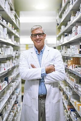 Buy stock photo Mature man, arms crossed or portrait in pharmacy with glasses, smile for healthcare industry or career. Male pharmacist, workplace or happy in drug store with service, professional and dispensary