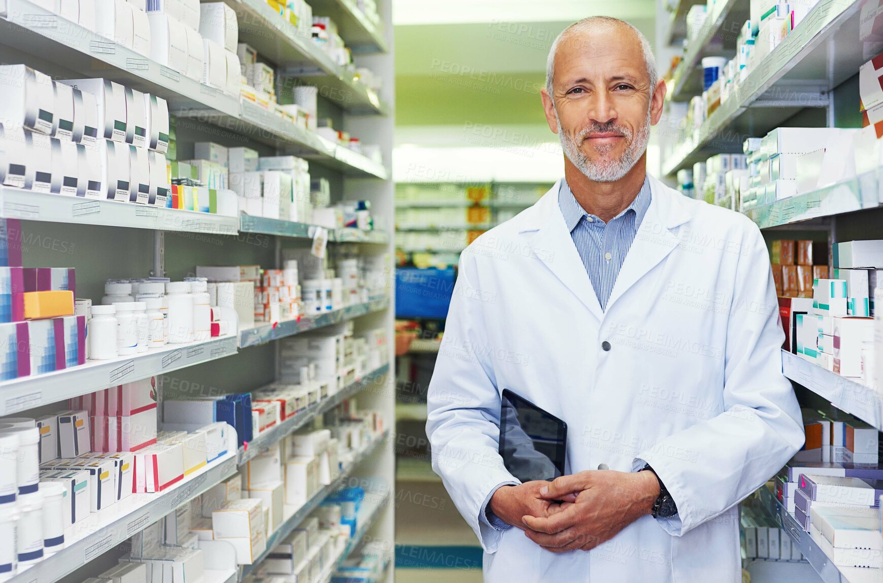 Buy stock photo Pharmacist, tablet and portrait in store for medicine, inventory and trust with healthcare service. Mature man, technology and smile in pharmacy for wellness prescription, pills and health supplement