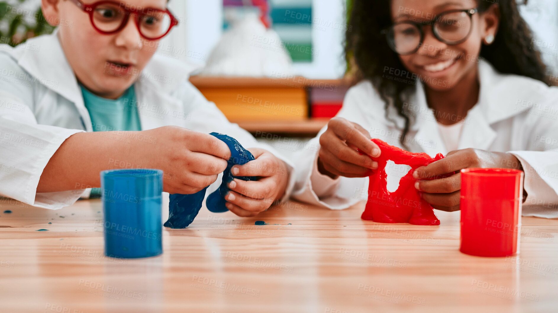 Buy stock photo Boy, girl and slime in classroom for science, thinking and happy for learning together at school. Children, diversity and education for chemical with idea for studying, growth or progress at academy