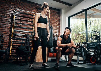 Buy stock photo Fitness, personal trainer and people squat for wellness, workout and training in gym. Healthcare, warm up and friends with exercise, male coach and body performance routine for leg muscle goals