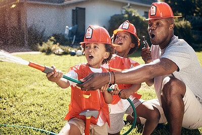 Buy stock photo Family, water and firemen in home for fun, learning development or excited in Halloween costume. African man, firefighter kids or hose pipe in backyard for activity, spray or summer games for bonding