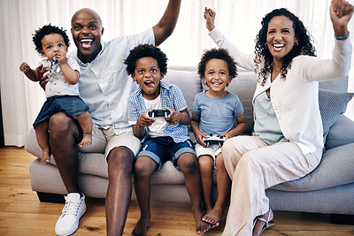 Buy stock photo Celebration, parents and kids gaming in home for bonding in living room together. Happy, entertainment and boy children playing online esports with mother and father cheering for win on sofa in house