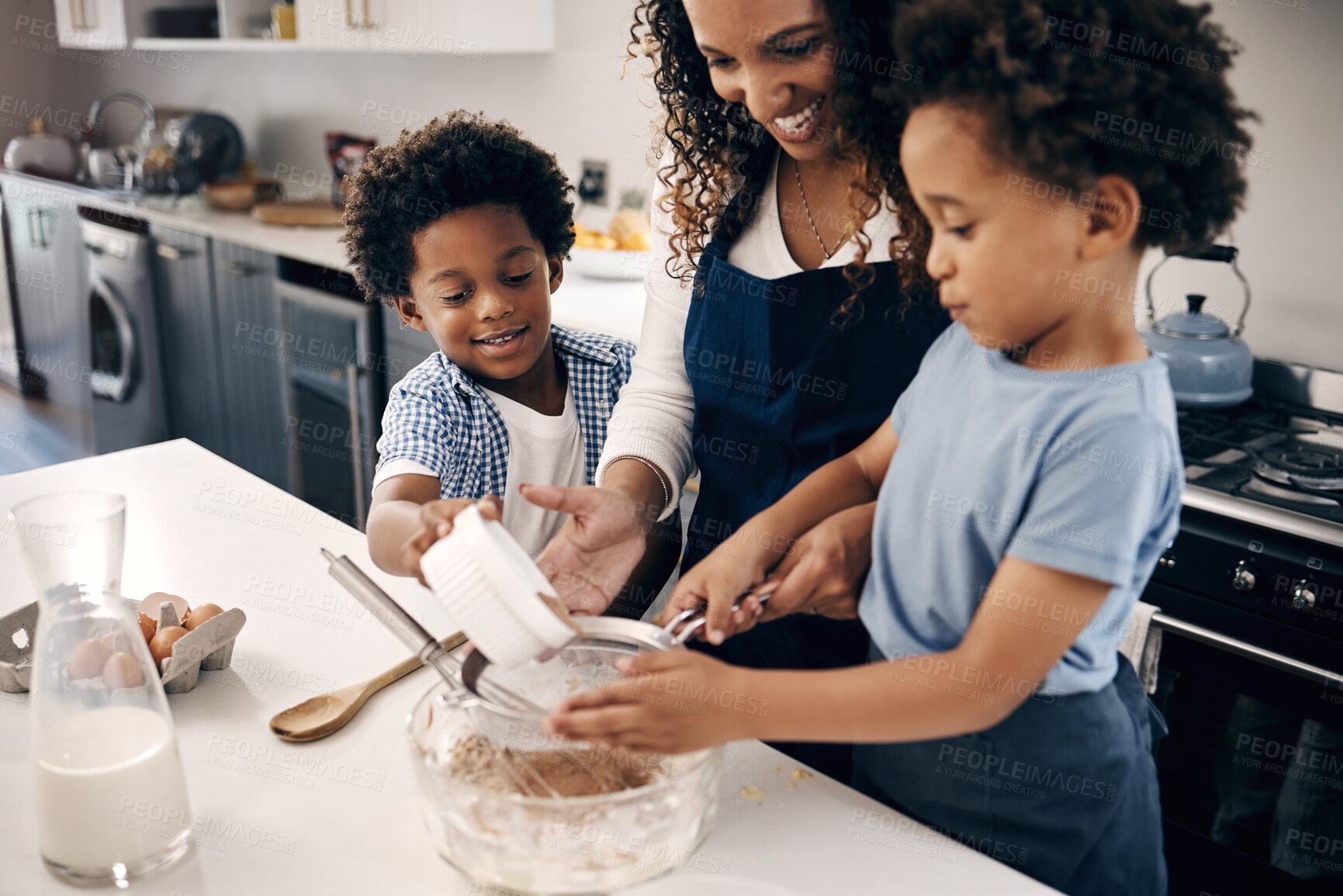 Buy stock photo Woman, children and help in kitchen for baking, teaching and relationship development in home. African mother, kids and cake ingredients at counter for bonding, family recipe or support for learning