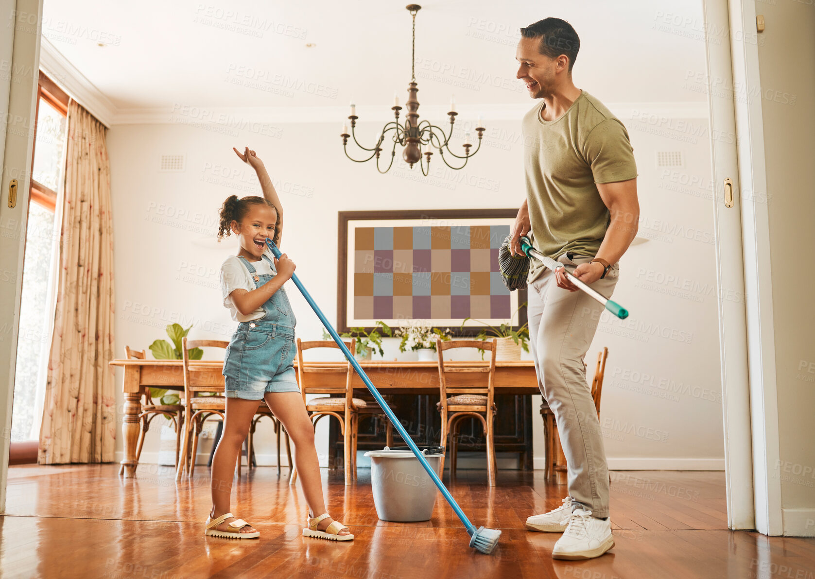 Buy stock photo Cleaning, dance or sing with dad and daughter in dining room of home together for weekend chores. Energy, family or music with single parent man and girl child in apartment for responsibility