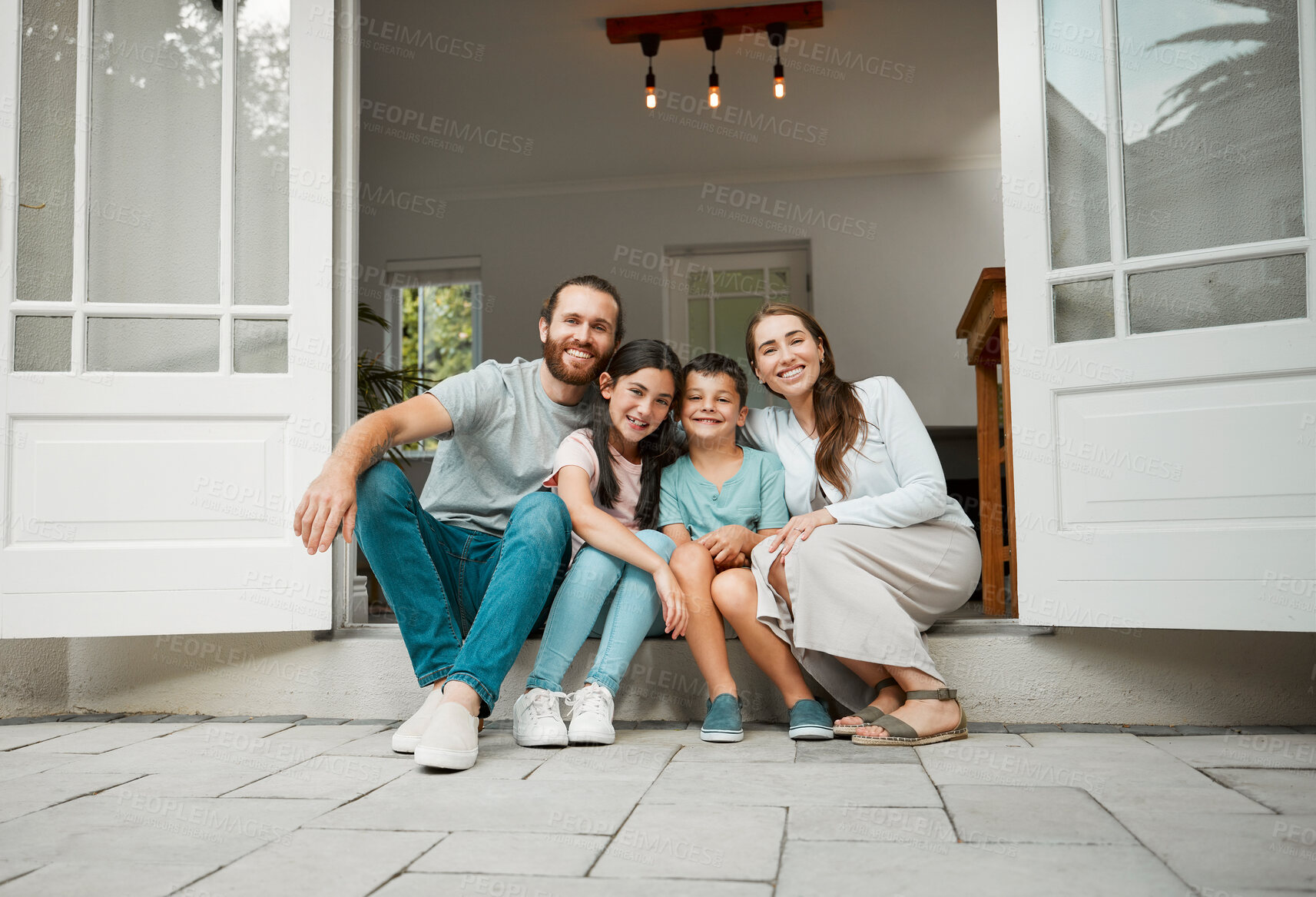 Buy stock photo Parents, children and happy in new home for portrait, real estate opportunity and property investment. Homeowner couple, kids and front door of family house with relax, pride and fresh start in Spain