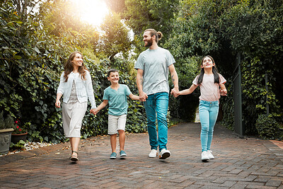 Buy stock photo Parents, holding hands or happy kids walking in park or neighborhood for bonding, adventure and weekend fun. Family, outdoor and mom with boy, girl or father with safety, siblings and smile in garden