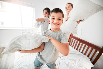 Buy stock photo Happy boy, pillow fight or portrait of mom, girl on bed in morning together for fun bonding in home. Smile, children or excited kids playing games for laughing with cushion, mother or parent in house