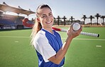 Sports, hockey and woman at a stadium for fitness, training and game practice, happy and proud. Field hockey, coach and sport leader portrait of lady holding a ball before endurance match on a field