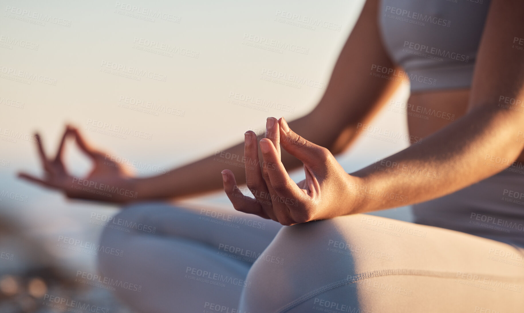 Buy stock photo Woman, hands or lotus pose meditation on sunset beach, ocean or sea in mental health, mind training or chakra balance. Zoom, peace or zen yogi in calm mudra, relax yoga wellness or sunrise gratitude