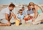 Sea, sand castle and happy family relax on vacation, summer travel and tropical holiday in sunshine. Parents, kids and building on beach sand for play, fun and love, care and quality time together 