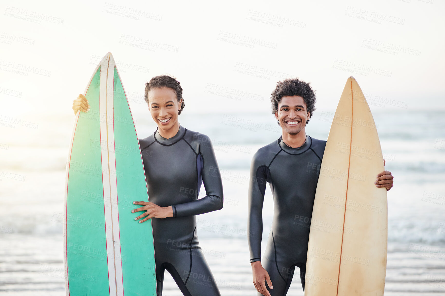 Buy stock photo Portrait, sports and surfing friends on the beach together during summer for fun or recreation. Surfboard, water or workout with a man and woman surfer standing in the ocean for training or leisure