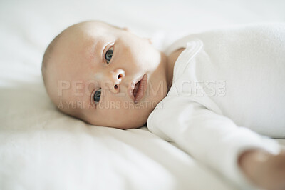 Buy stock photo Baby, portrait and young newborn on a home bedroom in the morning calm and relax. Healthy smile, child face and a house with a toddler ready for a nap, sleeping and rest on a duvet and blanket