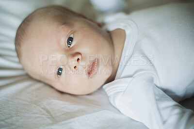 Buy stock photo Face of baby lying on bed in nursery room, house and home for comfortable lifestyle, childcare or infant babies. Cute little newborn kids relax in bedroom for healthy development, growth or calm rest