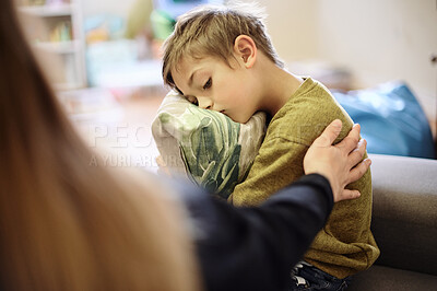 Buy stock photo Anxiety, bullying and hand of mother with boy hugging pillow for comfort, compassion and empathy at home. Disability, abuse and mom with sad child suffering depression or mental health problem 