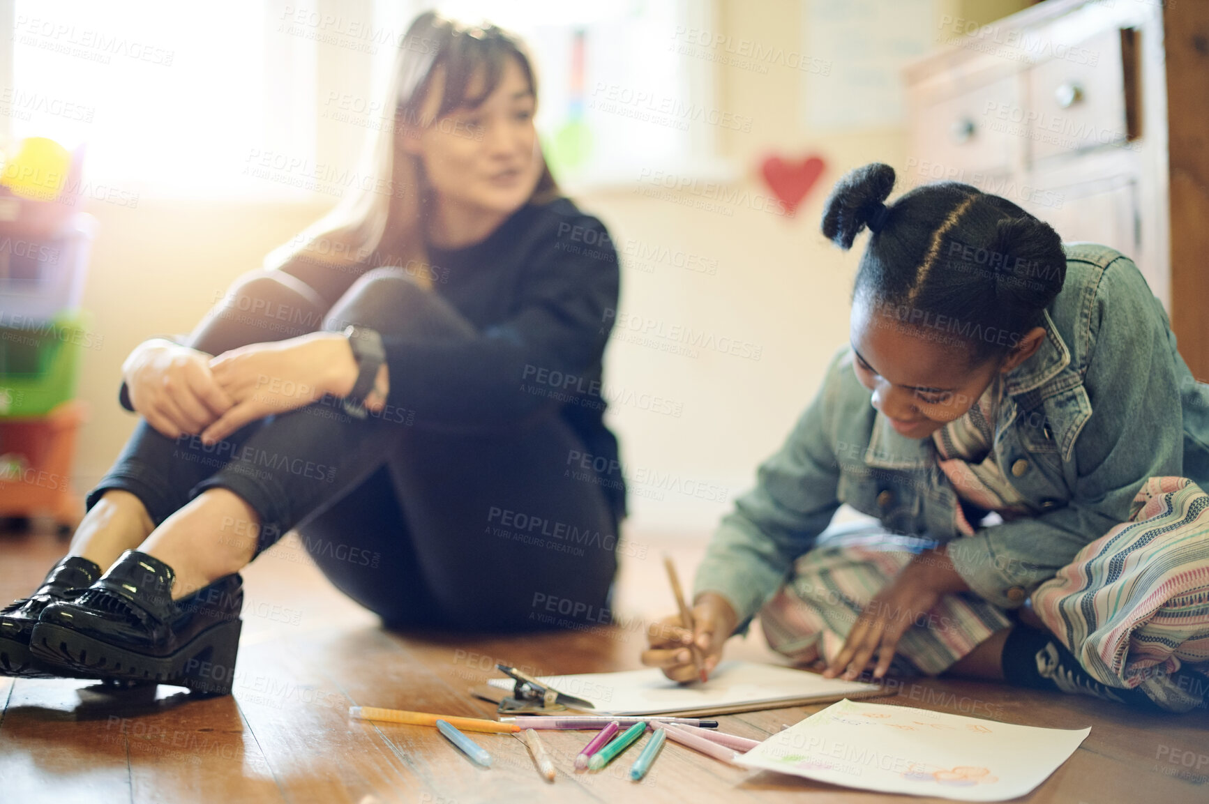 Buy stock photo Psychologist woman with child color drawing for assessment, evaluation or support of mind development. Creativity, writing and biracial people and kid on floor talking, helping and teaching therapy