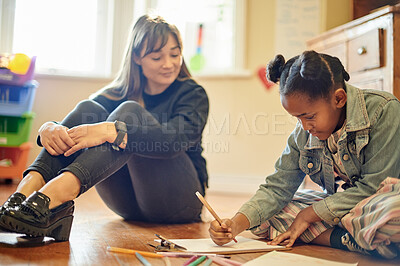 Buy stock photo Creative, teacher and girl drawing for education, art therapy and expression in a classroom. Support, project and a woman with a student for learning creativity and helping with writing homework