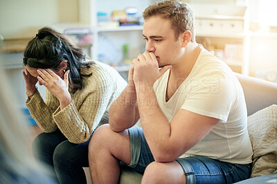 Buy stock photo Conflict, upset and couple fighting on a sofa for toxic, cheating or relationship breakup. Upset, problem and frustrated young man and woman in an argument together in the living room of their home.