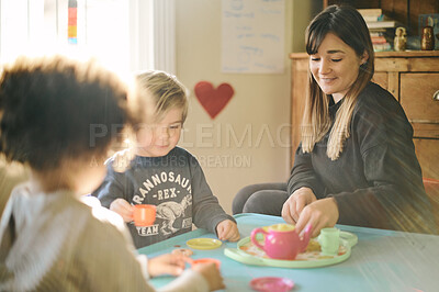 Buy stock photo Mother, kids and play tea party in home, having fun and bonding together. Relax, children and drinking from toy cup with mama playing game with boys for imagination, childhood or pretending in house.