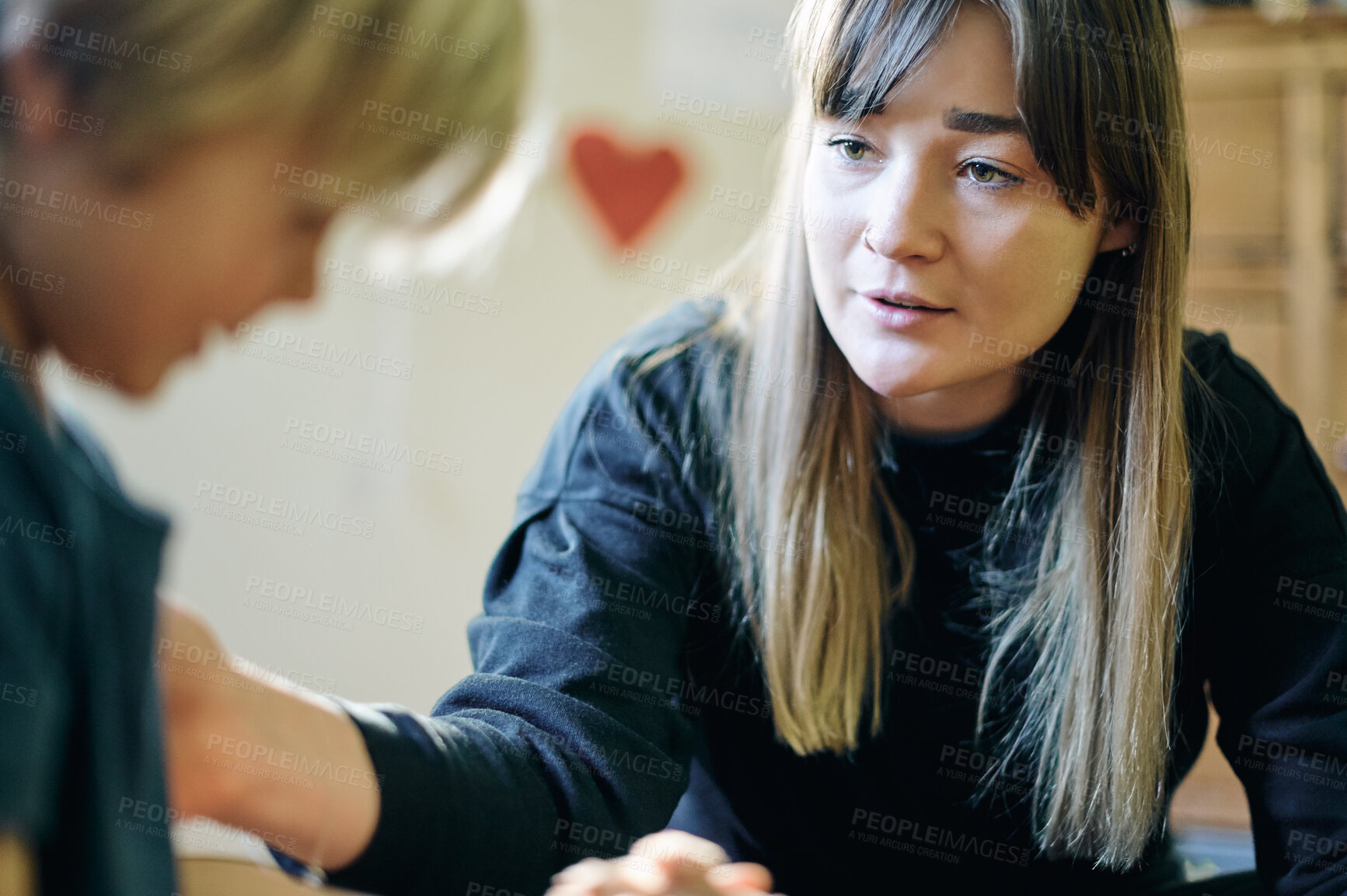 Buy stock photo Therapy, mental health and therapist talking to a child with anxiety for comfort in clinic. Psychology, healthcare and female kid psychologist speaking to young boy in office at wellness center