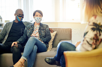 Buy stock photo Marriage, counselling and couple in therapy session, conversation and advice for relationship. Therapist, black man and woman with mask, psychology and consultation for issue, problems and discussion