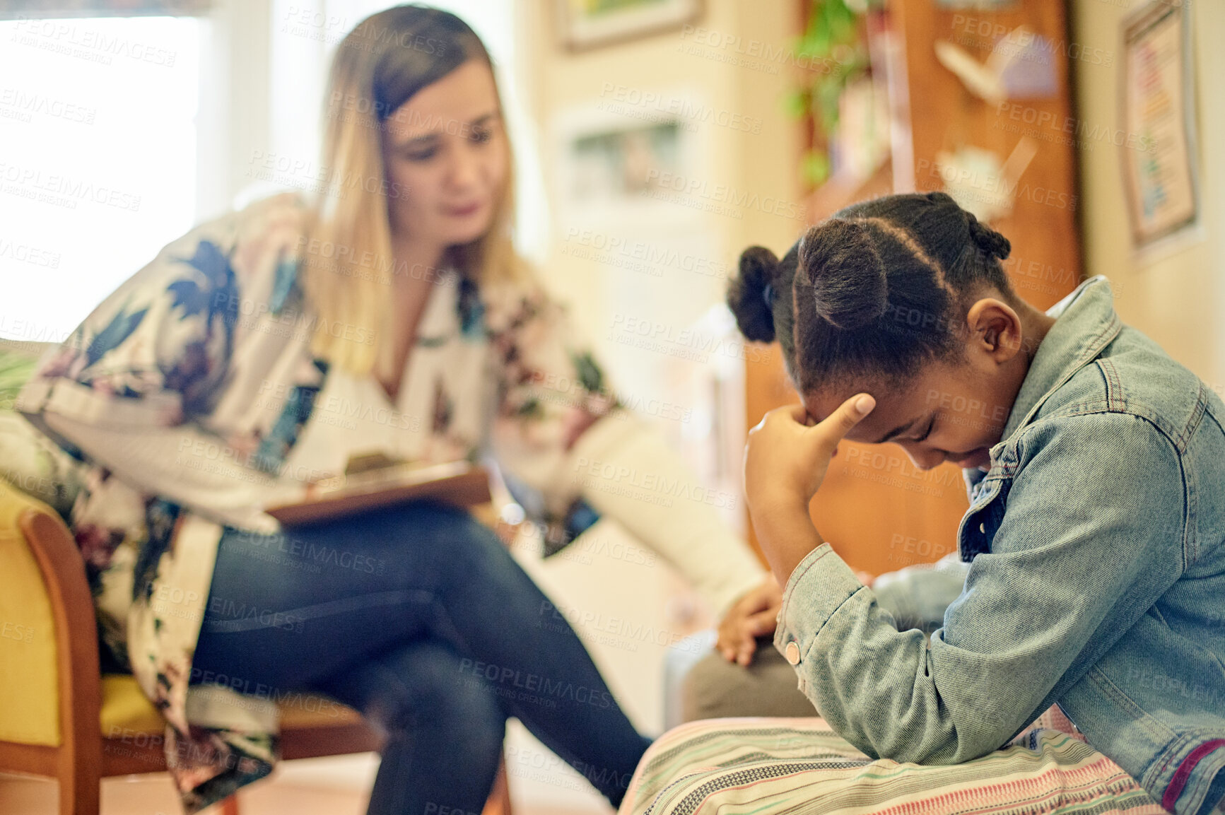 Buy stock photo Girl child, stress and sad with psychologist woman for therapy, mental health problem or depression. Female therapist, childhood psychology consultation or guidance counselor at school with anxiety