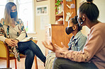 Psychologist, mother and child in consultation during covid for help, mental health and support. Face mask, therapist and woman talking with black girl and mama for counselling, therapy or advice.