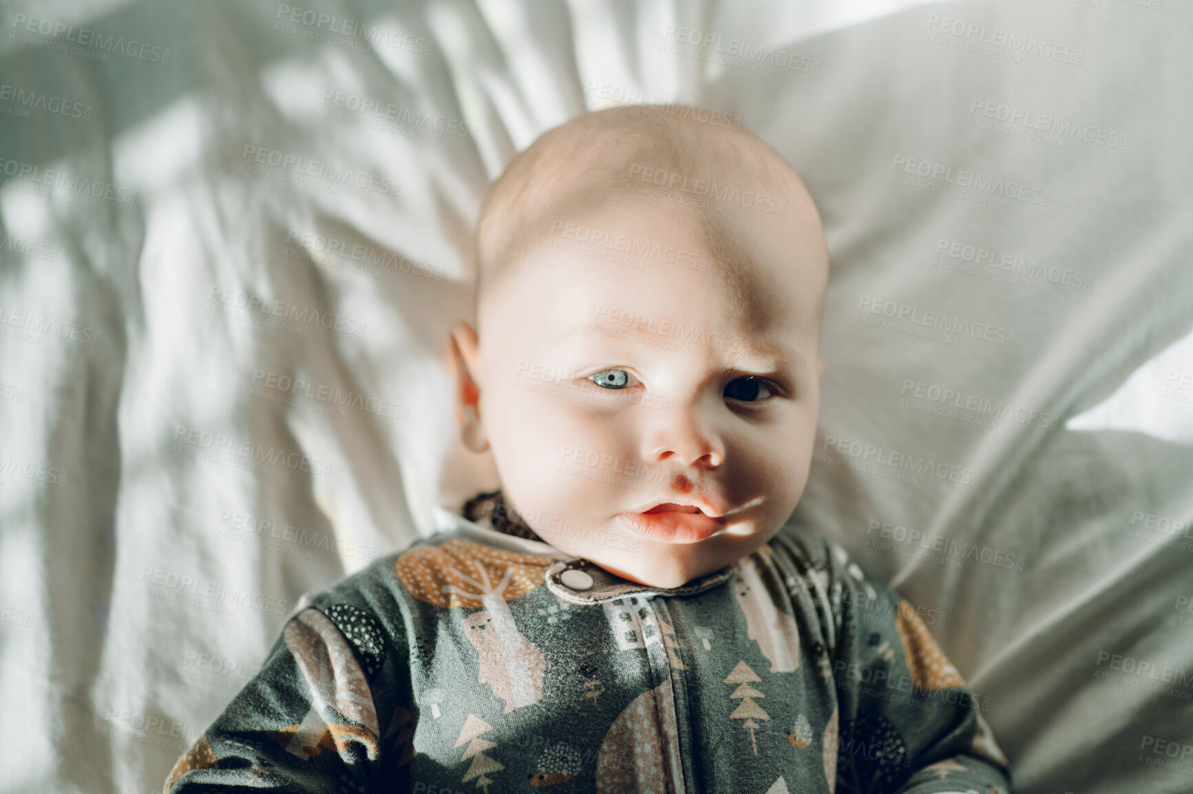 Buy stock photo Baby, face and portrait with cute child in nursery, relax with growth and early childhood development. Sunshine, morning and little kid at family home, calm adorable infant in bed and above
