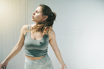 Buy stock photo Dance, fitness and a woman in the city for training, exercise and a workout. Space, sports and an athlete runner dancing for cardio, sport health and ready for running with mockup on a white wall