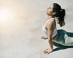 Cobra stretching, woman and yoga on mockup ground for workout, training and fitness in sunshine. Calm female, stretching and flexible body outdoor for wellness, push up and exercise on mock up space