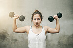 Portrait, dumbbell and woman with fitness, workout and training for wellness, endurance or healthy lifestyle. Face, female athlete or lady with gym equipment, practice or exercise for goals or target