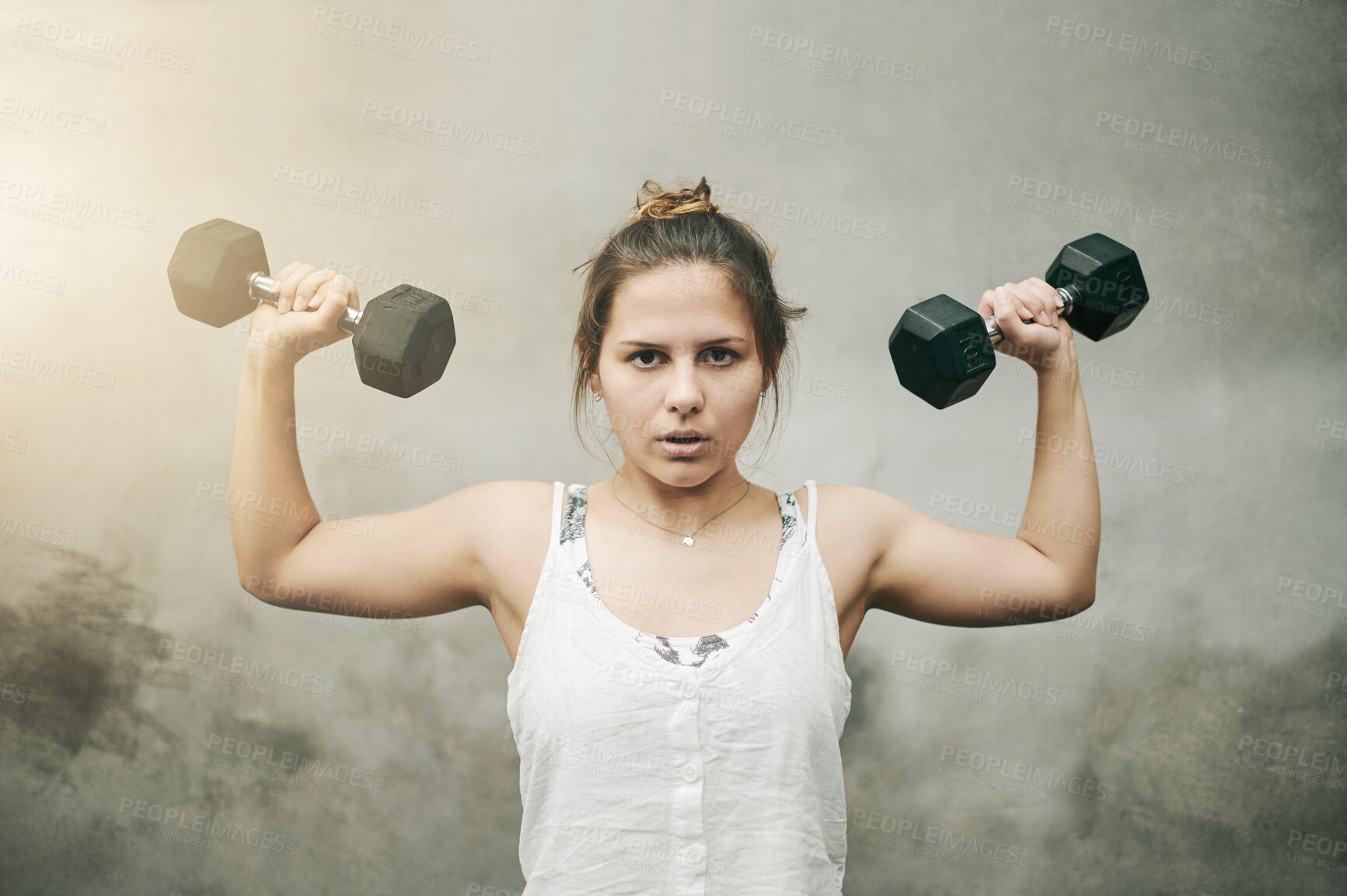 Buy stock photo Portrait, dumbbell and woman with fitness, workout and training for wellness, endurance or healthy lifestyle. Face, female athlete or lady with gym equipment, practice or exercise for goals or target