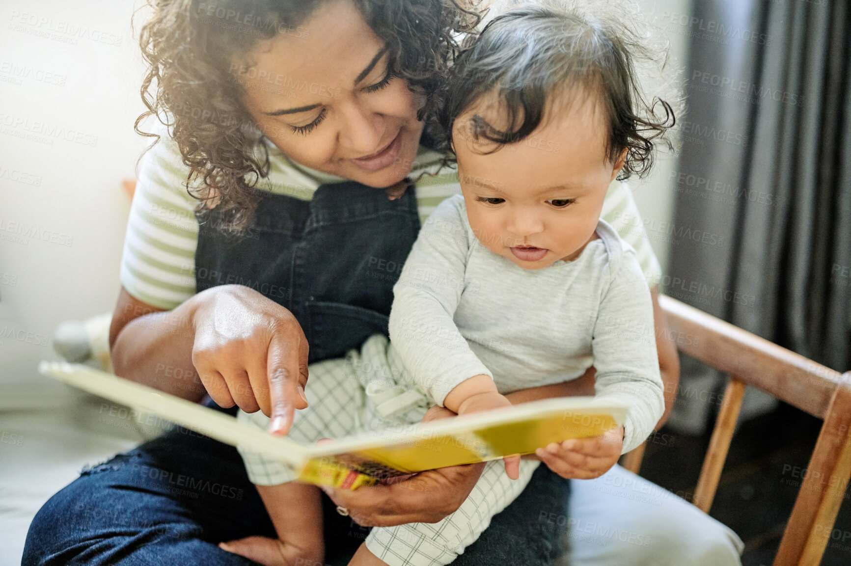 Buy stock photo Family, child development and a woman reading to her baby in the bedroom of their home together. Children, babies and a mother storytelling to her adorable toddler while bonding in their house