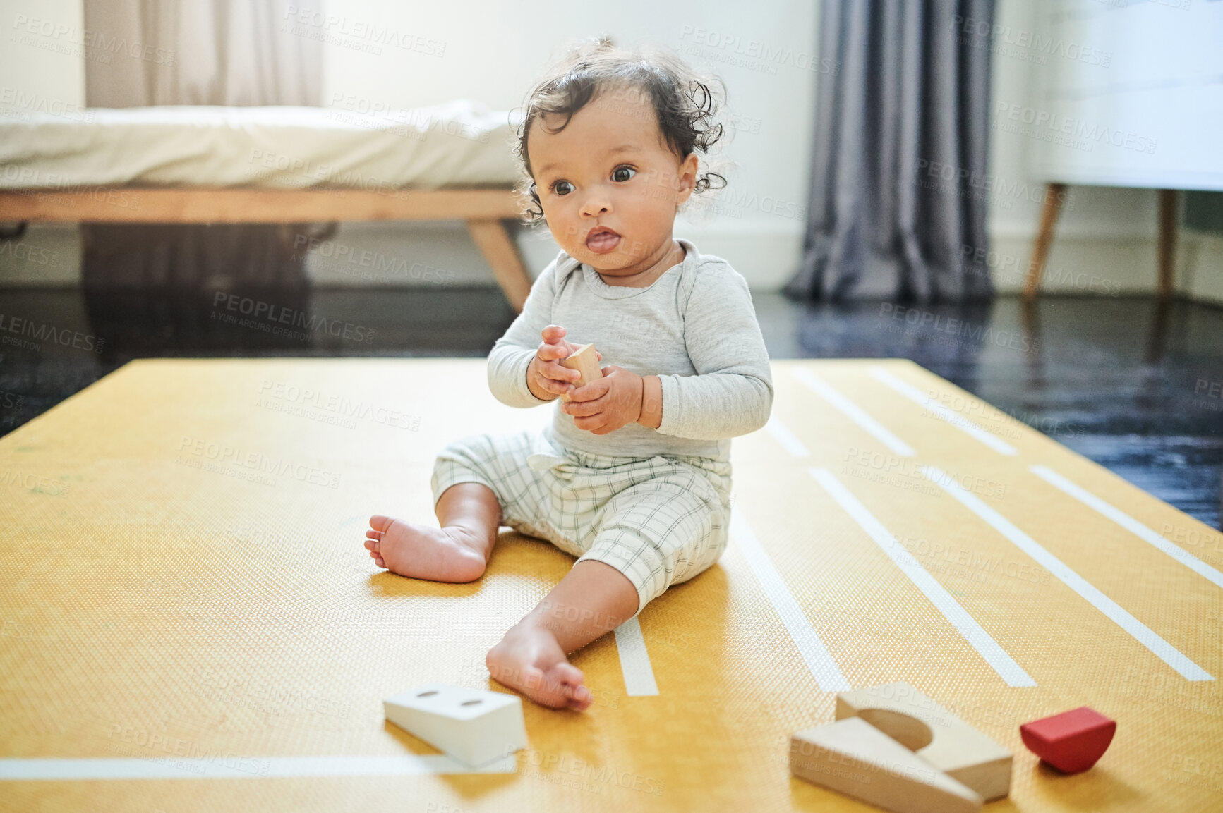 Buy stock photo Baby boy, blocks and fun playing on floor in home, childhood growth and development. Kids, educational wooden toys and games for montessori learning, creative puzzle and motor skills in nursery room