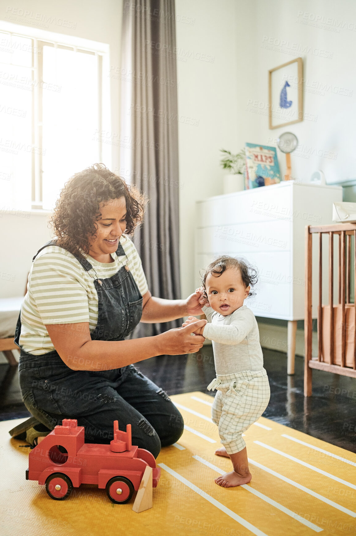 Buy stock photo Family, nursery and mother playing with baby in bonding, quality time or child development at home. Love, motherhood and happy mom helping kid learning to walk with toy, support or care in bedroom