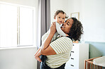 Love, comfort and happy woman with her baby in nursery playing, bonding and spending quality time. Maternal, happiness and mother holding her infant boy child with a smile in bedroom at their home.