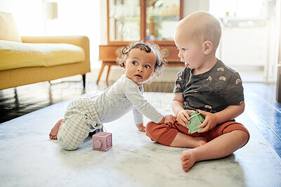 Buy stock photo Baby play, home and kids toys for mobility development and learning together in a bedroom. Nursery, toy brick and cute children friends about building blocks activity in a house on the floor