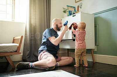 Buy stock photo Getting ready, kids and a father helping his son to pick an outfit from the cupboard in a bedroom. Children, clothes and dressing with a young man teaching his toddler child about chores or packing