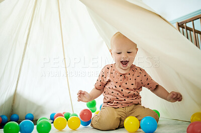 Buy stock photo Child, excited and playing with toys in home bedroom with a tent for fun and growth development. Happy male toddler kid with color balls for learning, education or game for happiness and creativity